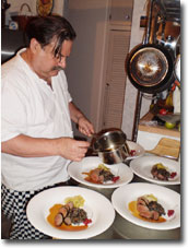 Pan Roasted Lamb Medallions with Wild Rice, Melted Leeks and Lamb Reduction