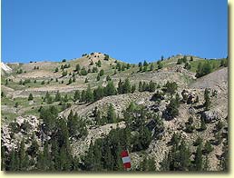 line of cyclists snaking up the switchbacks